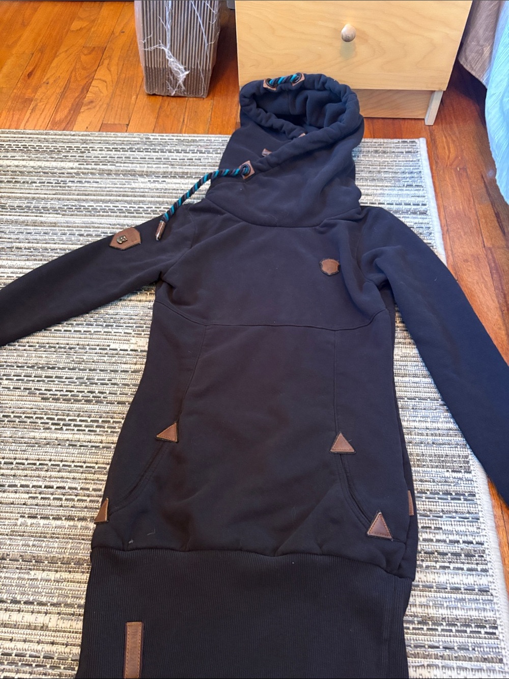 Naketano Black Top with Brown Leather Patch and Brass Owl Accent